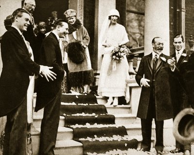 King George Waves Goodbye to Princess Maud, daughter of the Princess Royal as she leaves for her honeymoon with Lord Carnegie, 1923 by English Photographer